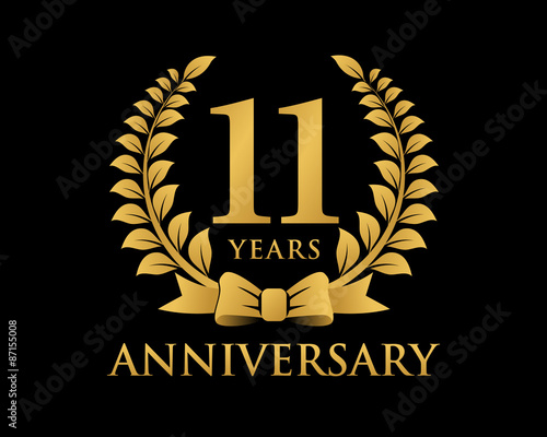 anniversary logo ribbon wreath black background 11