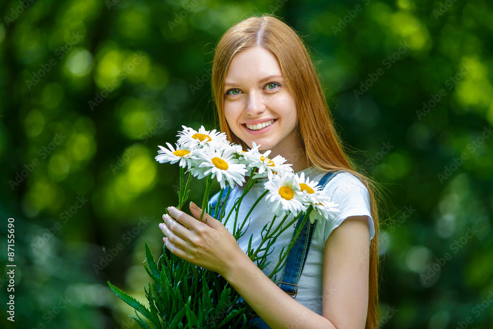 Beautiful smiling red-haired young woman Beautiful smiling red-haired young woman