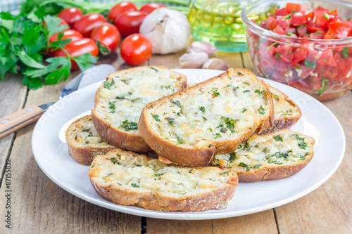 Crostini with basil, parsley, garlic and cheese