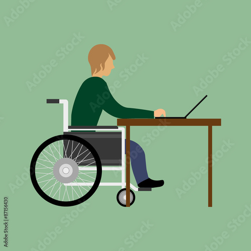 Handicapped man working with laptop