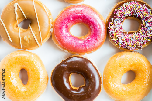 Glazed Doughnuts with colourful sprinkles