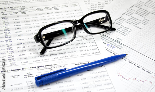 Glasses   pen and financial