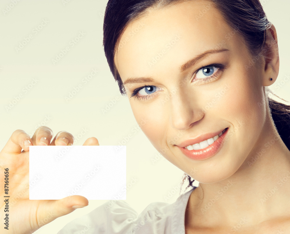 Businesswoman showing business or plastic credit card Businesswoman showing business or plastic credit card
