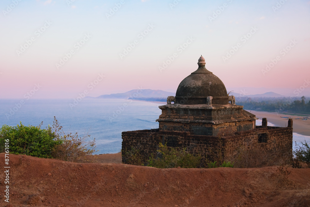 Small Hindu temple on the mountain near the sea