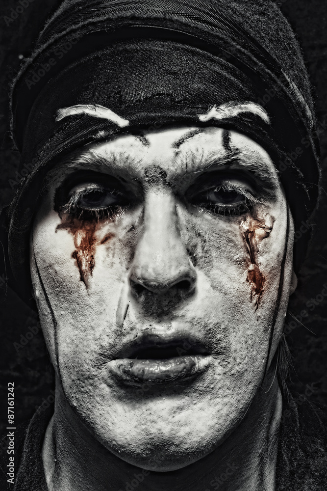 theatrical actor with dark makeup theatrical actor with dark makeup