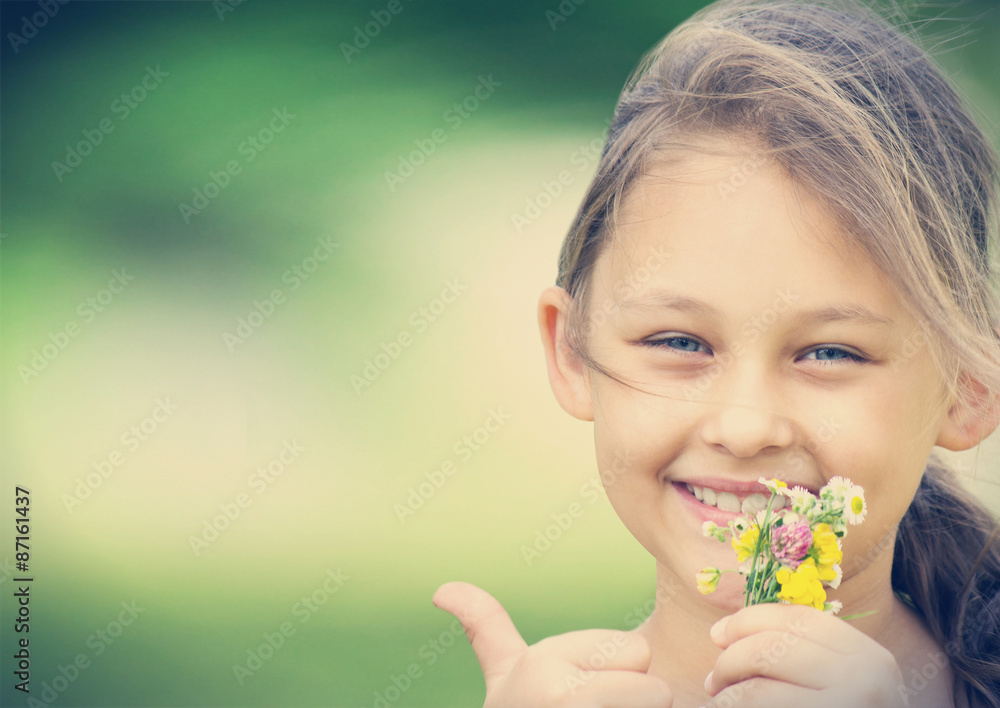 kid and wild flowers