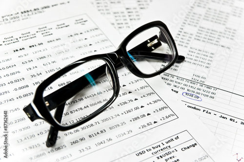 Glasses and financial documents