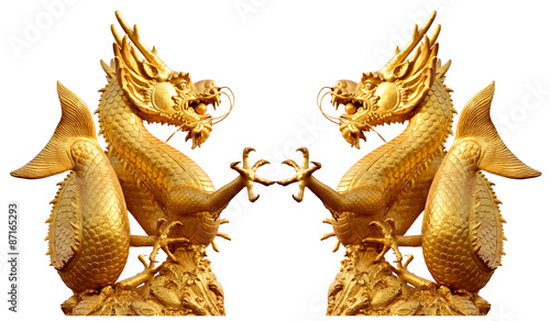 Double golden dragon statue at isolated on white background