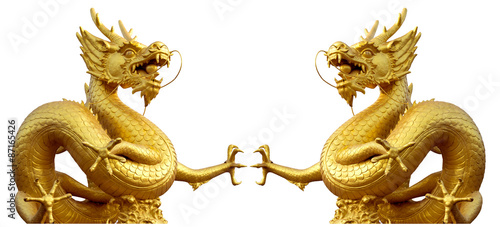 Double golden dragon statue at isolated on white background