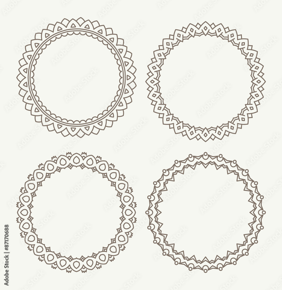 Set of 4 rich decorated calligraphic round frames. Set of 4 rich decorated calligraphic round frames.