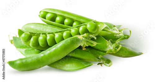 Pile green peas in pods