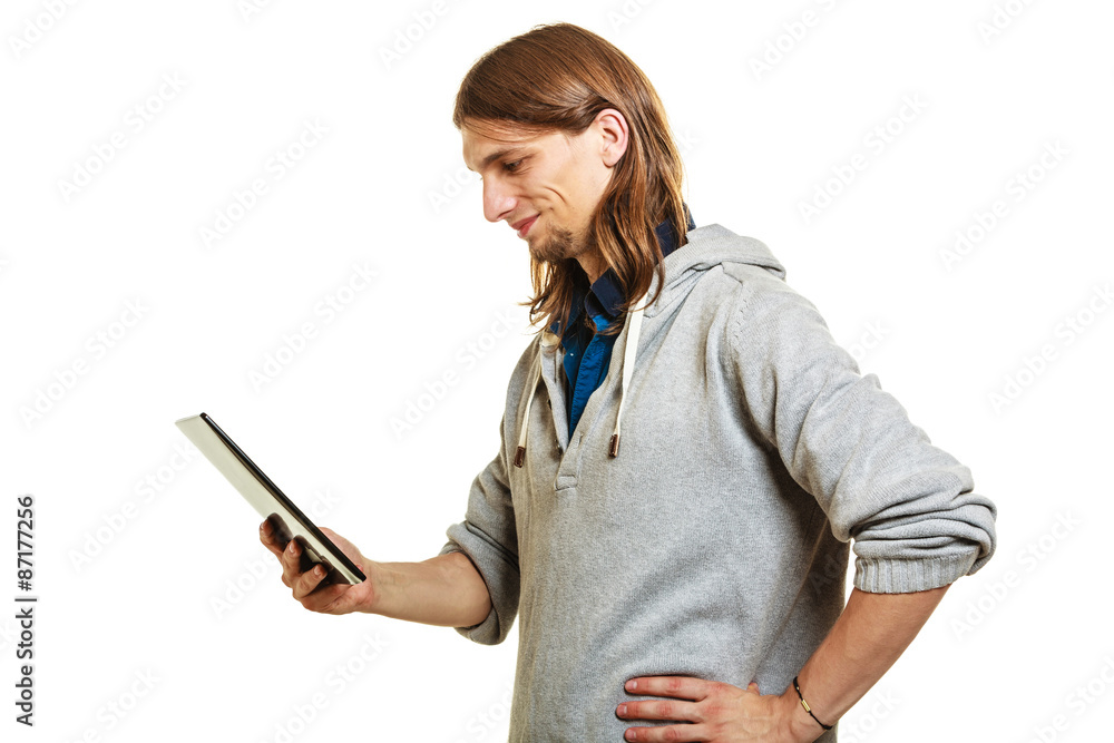 Fototapeta premium Fashion man using pc tablet browsing internet.