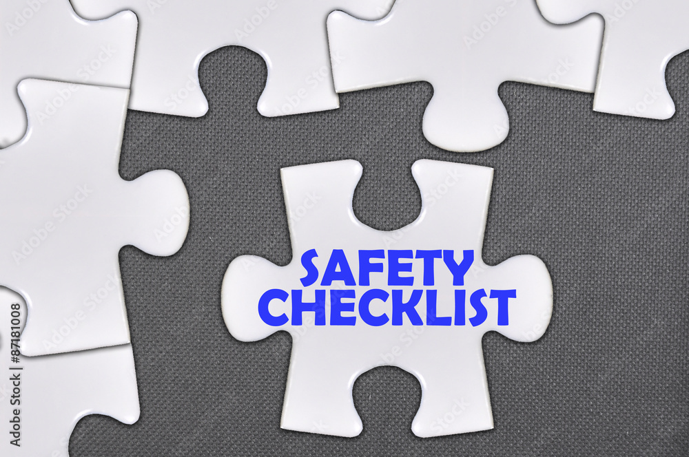Fototapeta premium jigsaw puzzle written word safety checklist