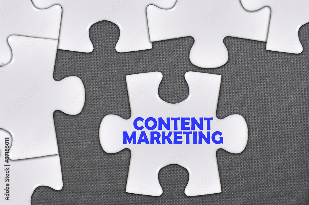 Fototapeta premium jigsaw puzzle written word content marketing