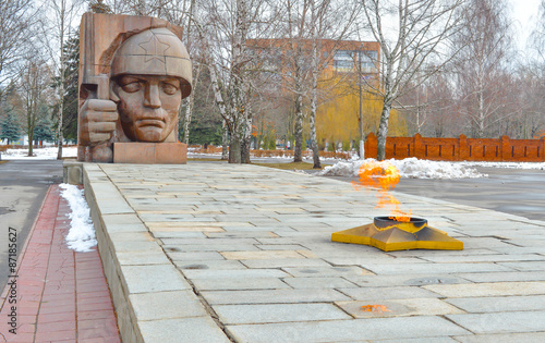 Eternal fire on memorial grave in Moscow quenchless flame dedicated to victory World War II photo