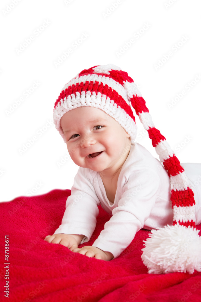Baby in red white knitted hat Baby in red white knitted hat