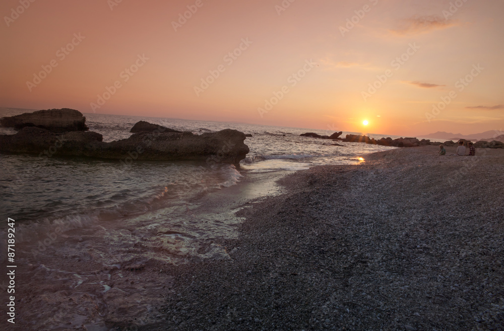 Obraz premium sunset summer - sea rocks