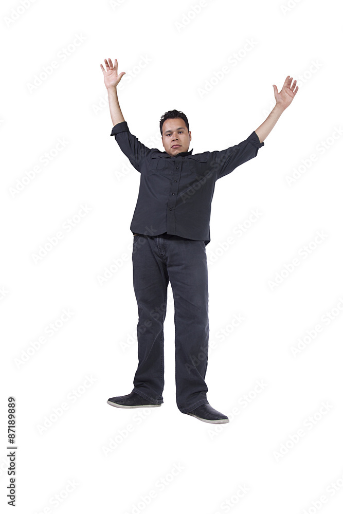 Casual Handsome Hispanic Man with His Hands Up Casual Handsome Hispanic Man with His Hands Up