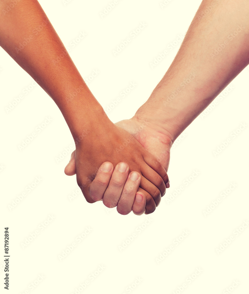 woman and man holding hands woman and man holding hands