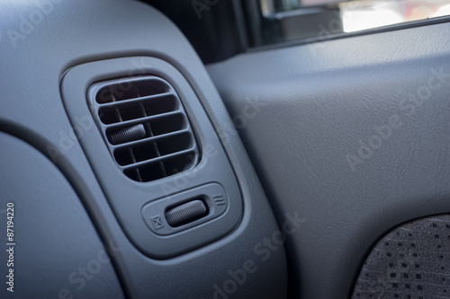 car air conditioning on a dark background © Himchenko