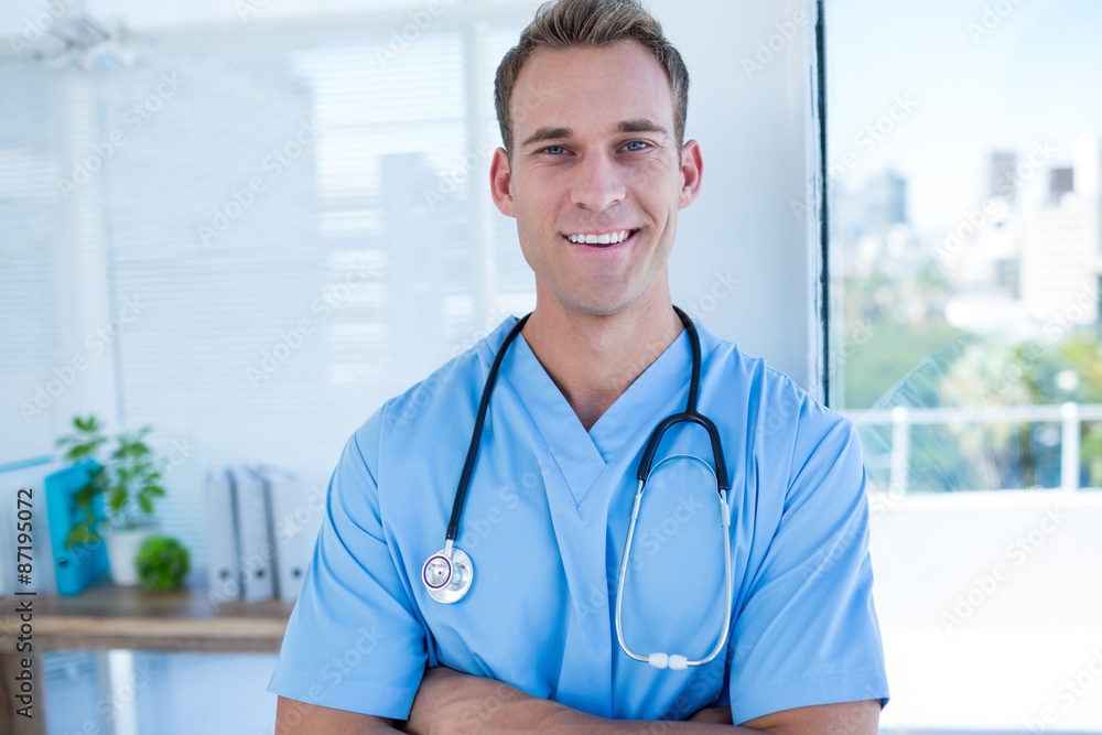 Smiling doctor looking at the camera Smiling doctor looking at the camera