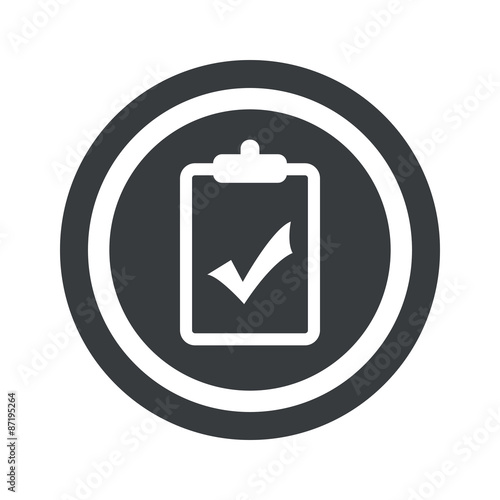 Round black clipboard YES sign