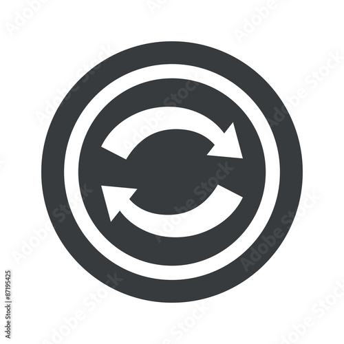 Round black exchange sign