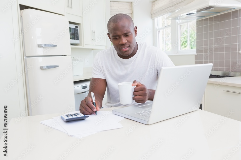 A man working and using his laptop A man working and using his laptop