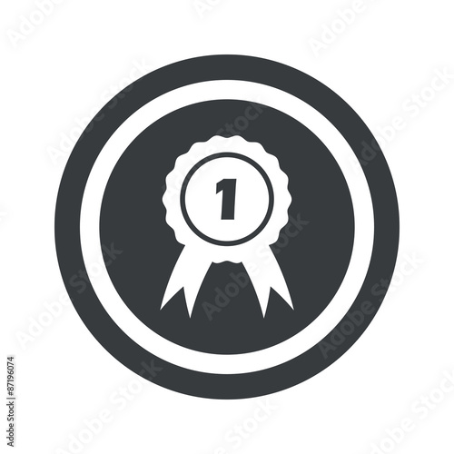 Round black first place sign