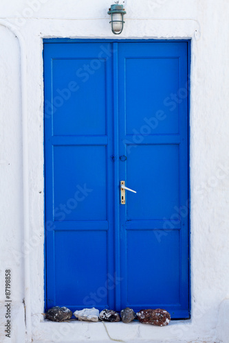 Blue door of a monastery. © dejank1
