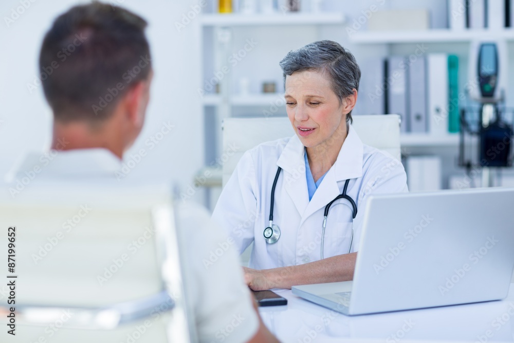Female doctor speaking with her patient Female doctor speaking with her patient