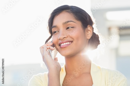Casual businesswoman talking on phone Free Download Casual businesswoman talking on phone - GFXLoad