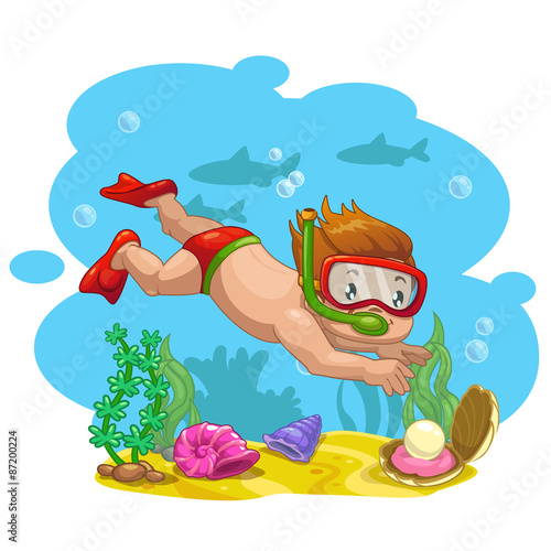 DiverLittle boy finds a shell