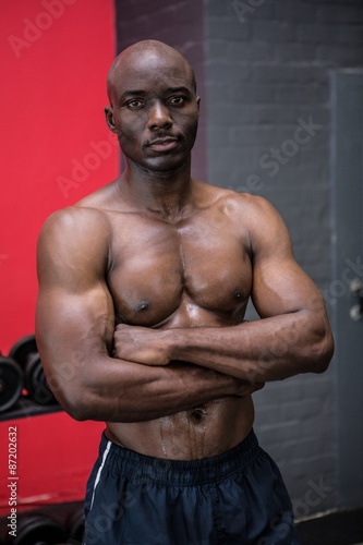 Young Bodybuilder posing in front of the camera