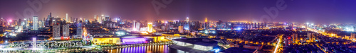 Panoramic illuminated skyline and cityscape