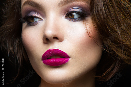 Beautiful young model with pink lips