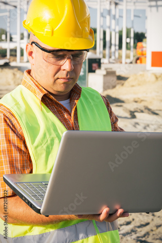 Construction Worker Using Laptop © zorandim75