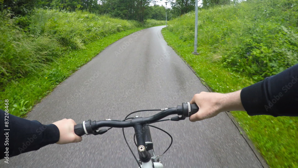 Man riding a bicycle. Point of view shot. Man riding a bicycle. Point of view shot.