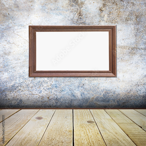 Picture frame on old empty room with concrete wall background vi