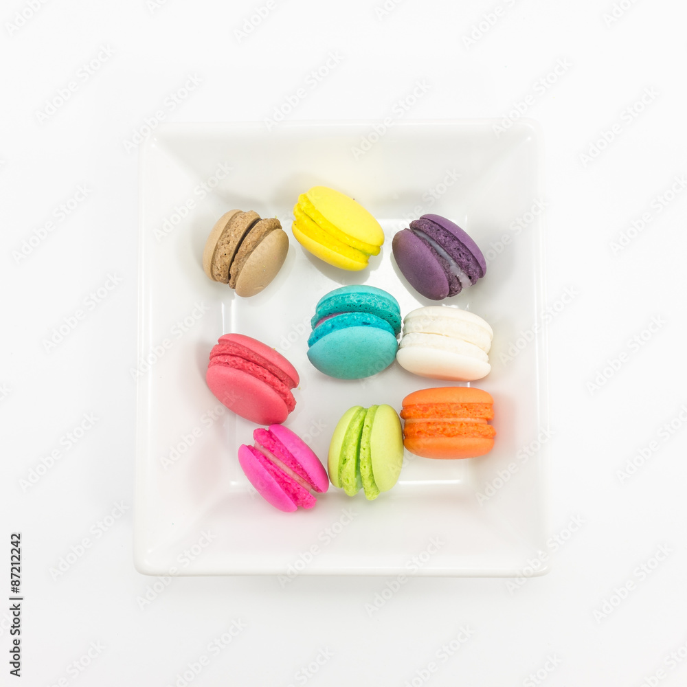 Obraz premium Macaron in plate on white background.