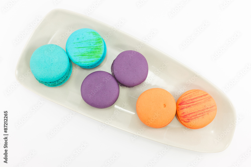 Macaron in plate on white background. Macaron in plate on white background.