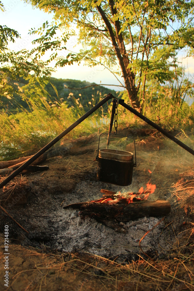 Cooking eat in bowler on the fire. Summer time Cooking eat in bowler on the fire. Summer time