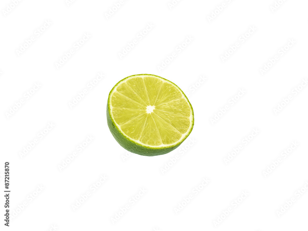 Lime cut in half on white background