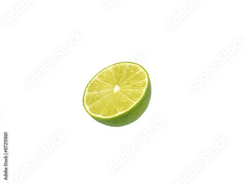 Lime cut in half on white background
