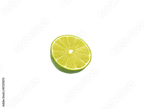 Lime cut in half on white background