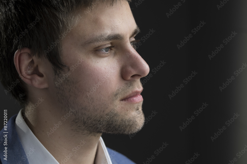 Obraz premium Portrait of a young man, serious expression