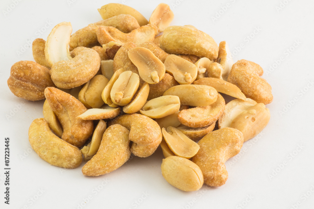Cashew nuts and Peanuts in white background Cashew nuts and Peanuts in white background