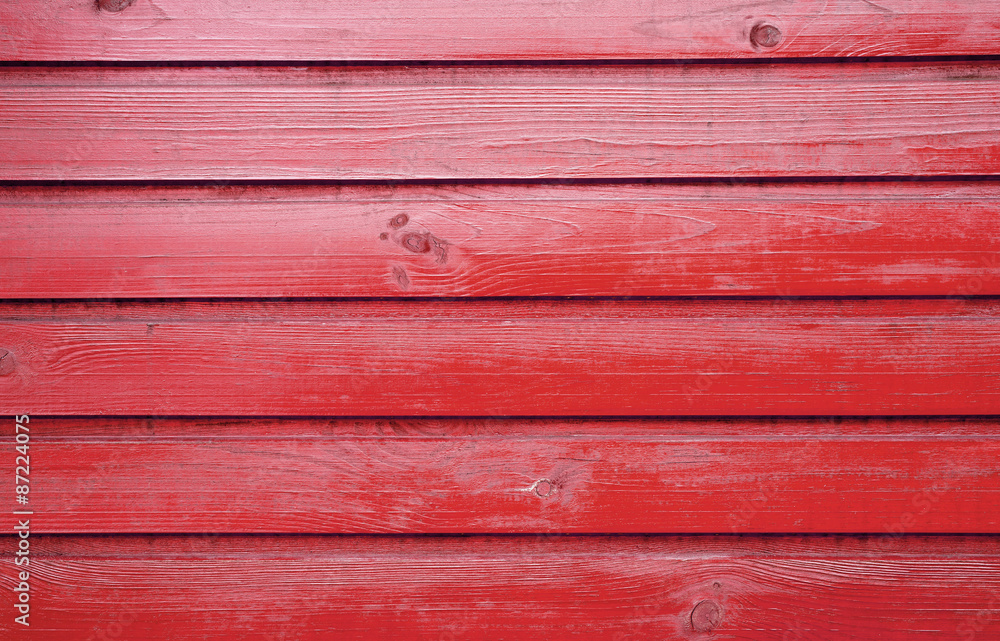Old wooden wall. Painted red