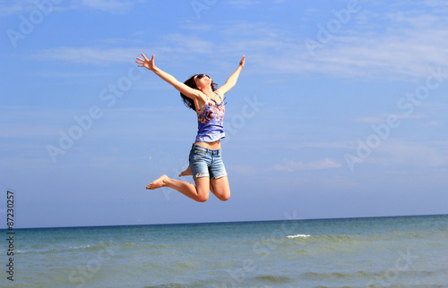 joyful woman on vacation, sea and beach