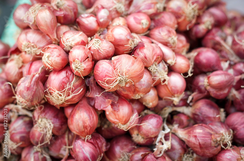 Shallot onions in a group.